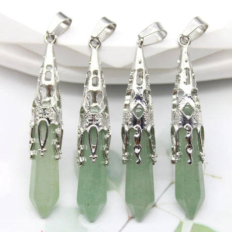 Four silver and green pendant necklaces on a white background