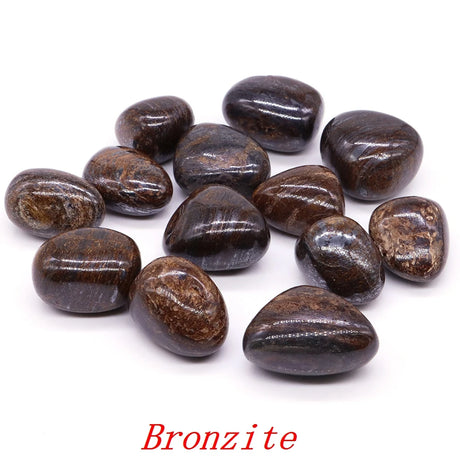 Bronzite stones on a white background with 'Bronzite' text.
