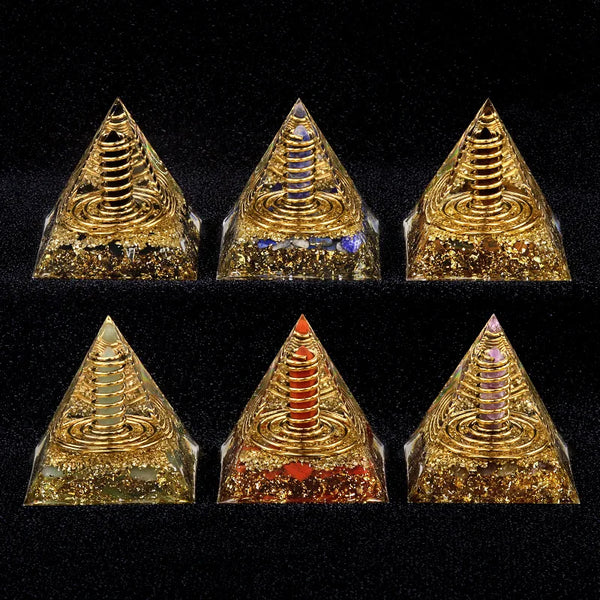Set of six gold pyramid-shaped objects on a black background