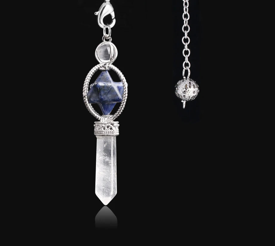 Crystal pendant necklace with silver chain on a black background