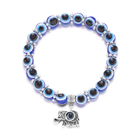 Bracelet with blue and black beaded design and elephant charm on a white background