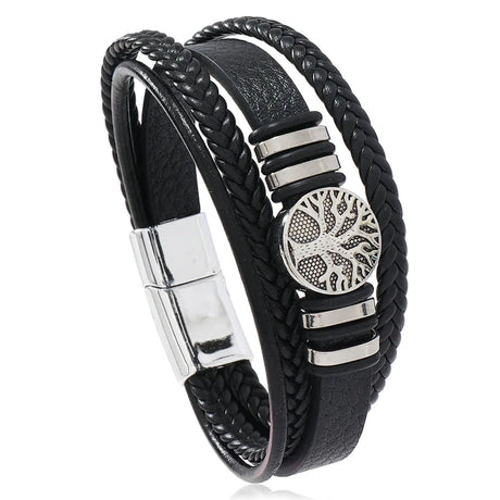 Black braided leather bracelet with silver tree of life charm on a white background