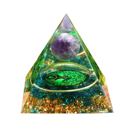 Triangular crystal pyramid with colorful stones and a purple sphere on a white background