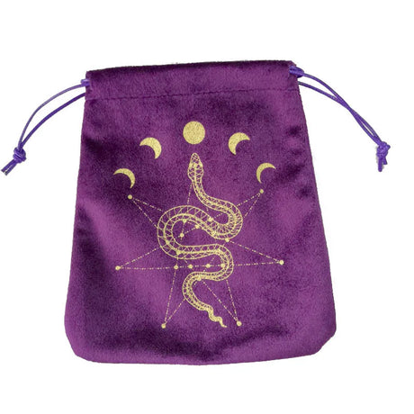 Purple drawstring bag with gold snake and moon design on a white background