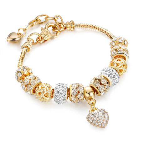 Gold and silver beaded bracelet on a white background