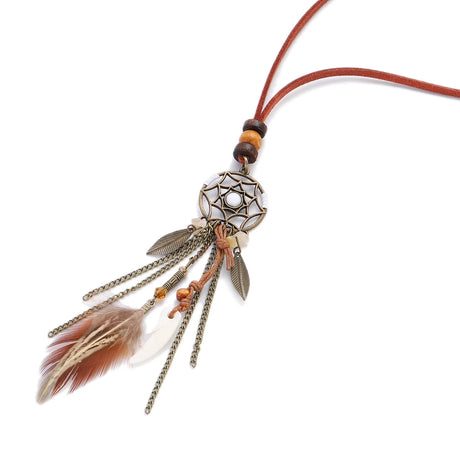 Necklace with dreamcatcher pendant and feathers on a white background