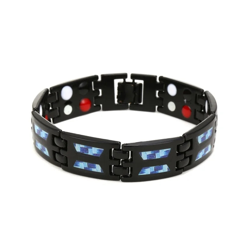 Black metal bracelet with blue and red accents on a white background
