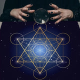 Hands holding a crystal ball with a geometric design and starry night background