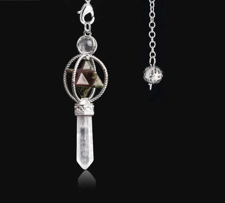 Crystal pendant necklace on a black background with 'Crista Jewelry' logo.