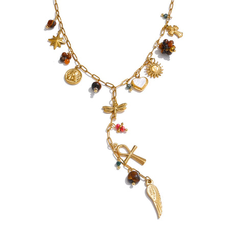 Gold necklace with various charms on a white background