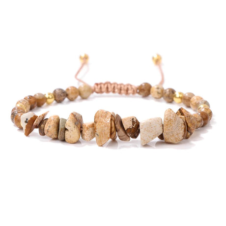 Beaded bracelet with natural stone beads on a white background