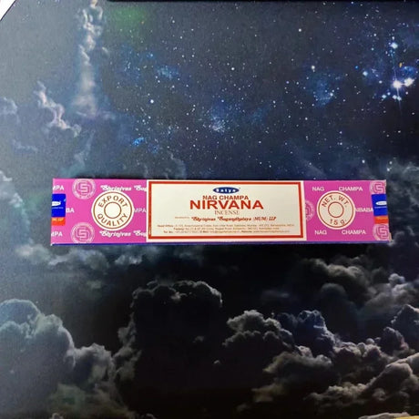 Nirvana incense box with a space-themed background