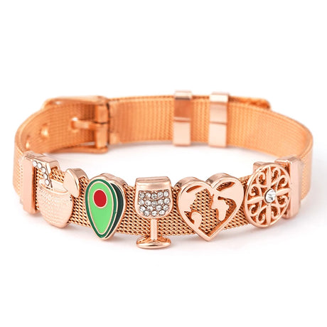 Rose gold dog collar with various decorative elements on a white background