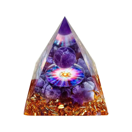 Triangular crystal pyramid with purple and gold elements on a white background