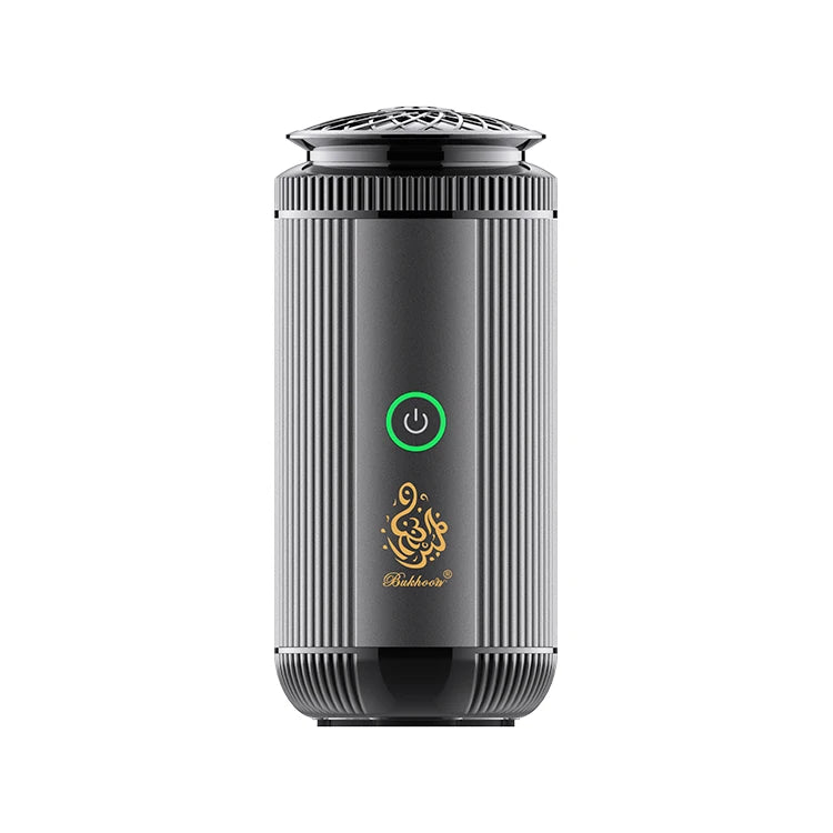 Black air diffuser with a green power indicator on a white background