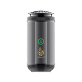 Black air diffuser with a green power indicator on a white background