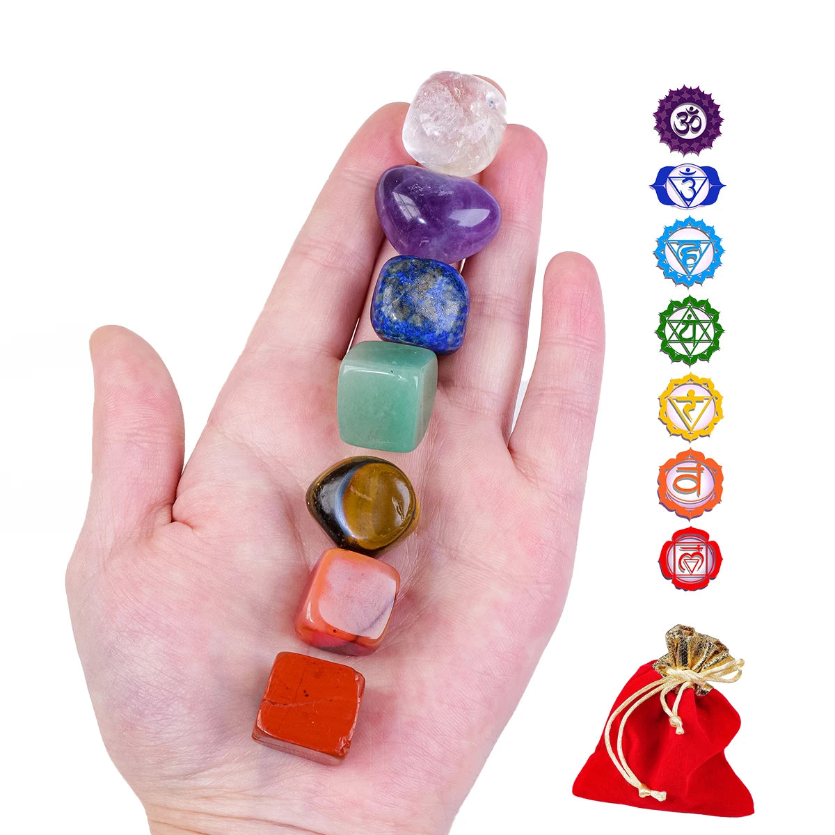 Hand holding seven chakra stones with corresponding symbols on a white background