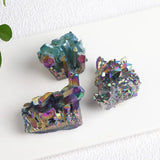 Multicolored crystal-like earrings on a white background