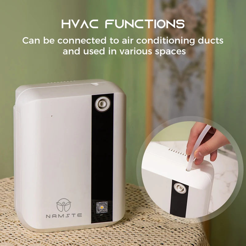 White HVAC function device with black accents on a textured surface, featuring the brand 'Namste'.