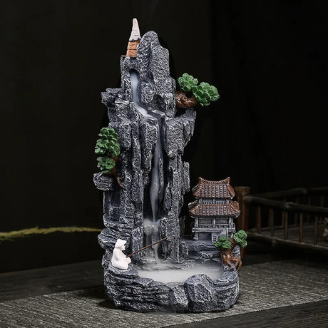 Decorative mountain with a pagoda and rabbit on a dark background