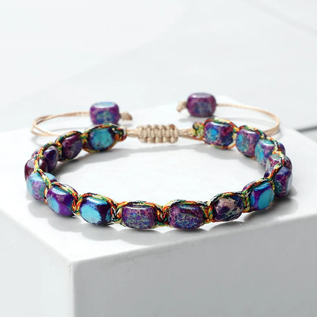 Multicolored beaded bracelet on a white surface