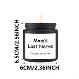 Black candle jar labeled 'Mom's Last Nerve' with dimensions on a white background