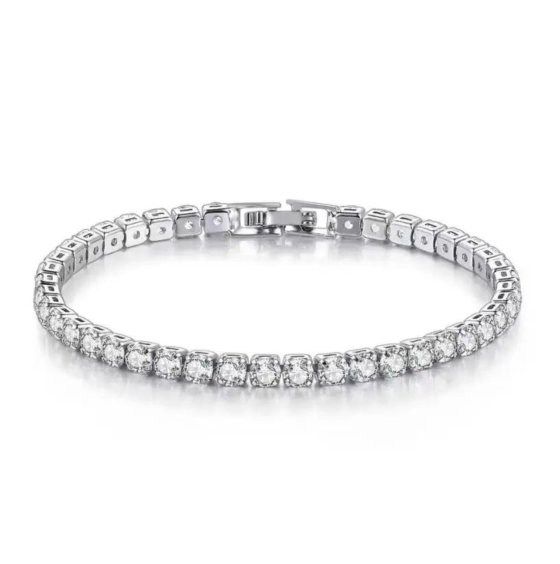 Silver bracelet with clear stones on a white background