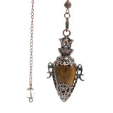 Decorative pendant with tiger's eye stone and chain on a white background