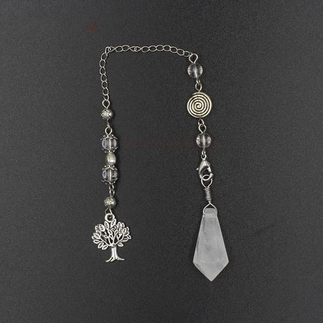 Silver beaded necklace with tree of life charm and crystal pendant on a dark background