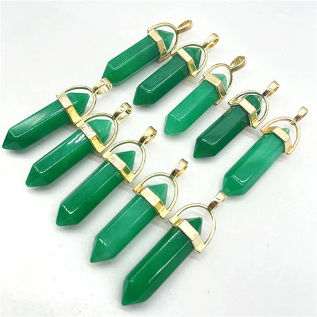 Green crystal pendants with gold accents on a white background