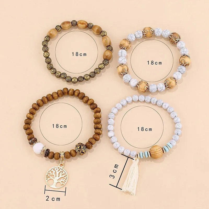 Four beaded bracelets with measurements on a beige background