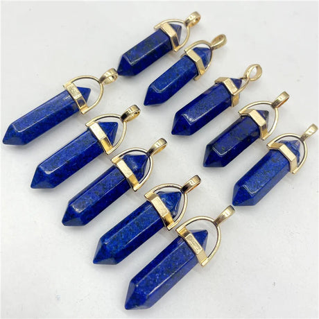 Blue crystal pendants with gold accents on a white background