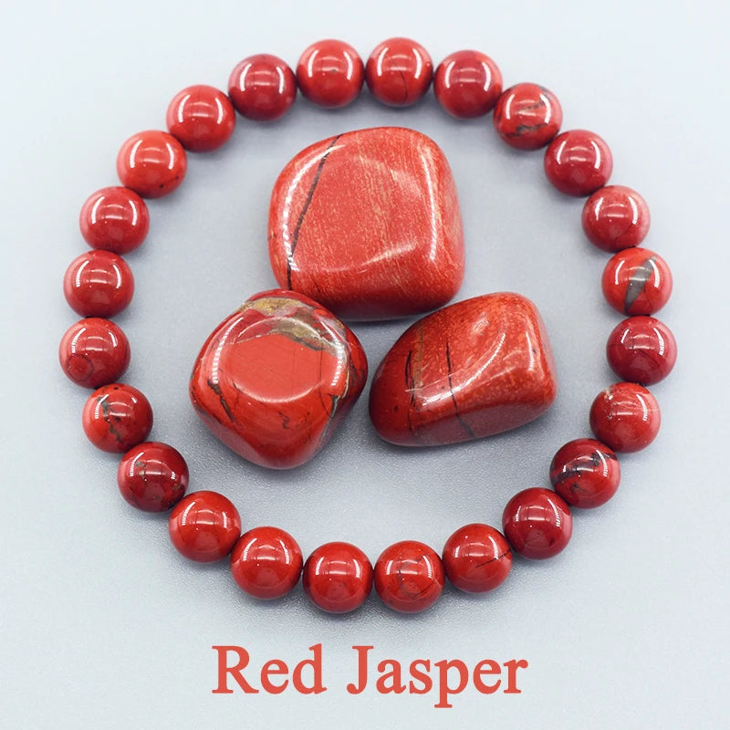 Red Jasper stones arranged in a circle on a white background with 'Red Jasper' text.