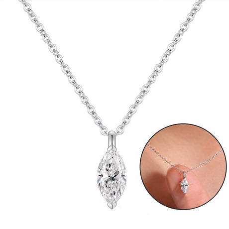 Silver necklace with a clear pendant on a white background