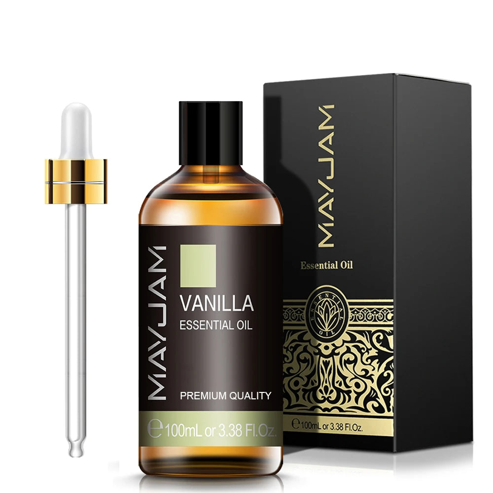 Mayujam Vanilla Essential Oil bottle with dropper and packaging on a white background