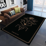 Black rug with astrological design in a living room setting