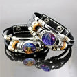 Multistrand bracelet with zodiac symbols on a reflective surface