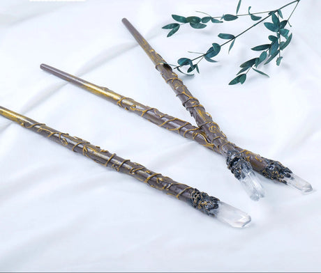 Two decorative sticks with crystal tips on a white background, featuring the brand 'Chakra Stone Runyangshi'.