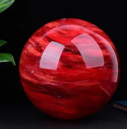 Red crystal ball with a black background