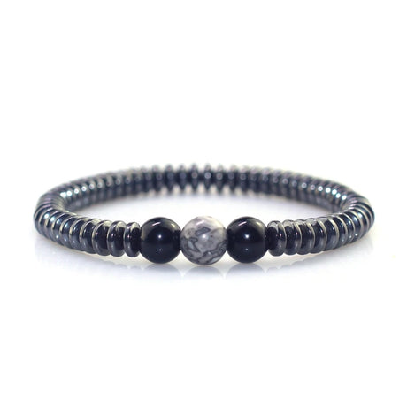 Beaded bracelet with black and gray beads on a white background
