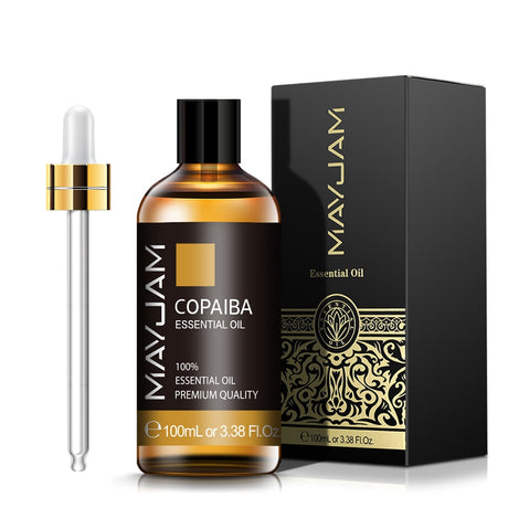 MayJam Copaiba essential oil bottle with dropper and packaging on a white background
