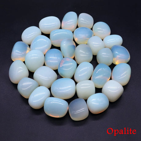 Opalite stones arranged in a circular pattern on a dark background