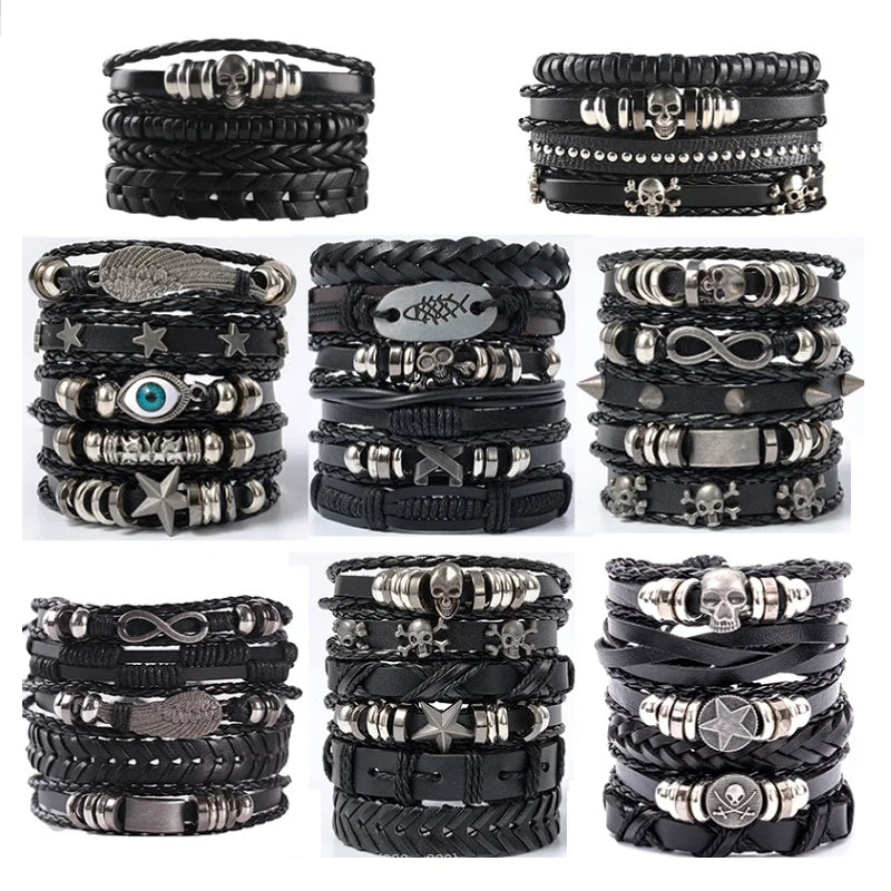 Collection of black leather bracelets with various metal charms on a white background