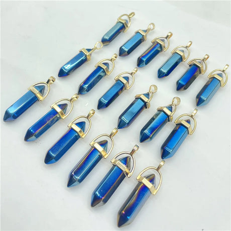 Blue crystal pendants with gold accents on a white background