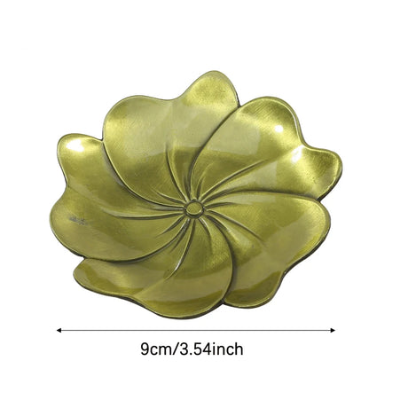 Gold-colored decorative plate with floral design and measurement text on a white background