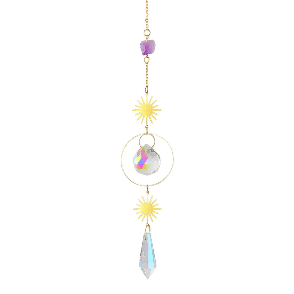 Decorative hanging chain with sun-shaped ends and crystal beads on a white background