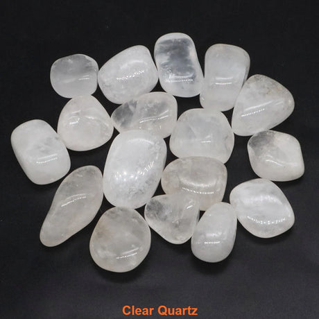 Clear quartz stones on a black background