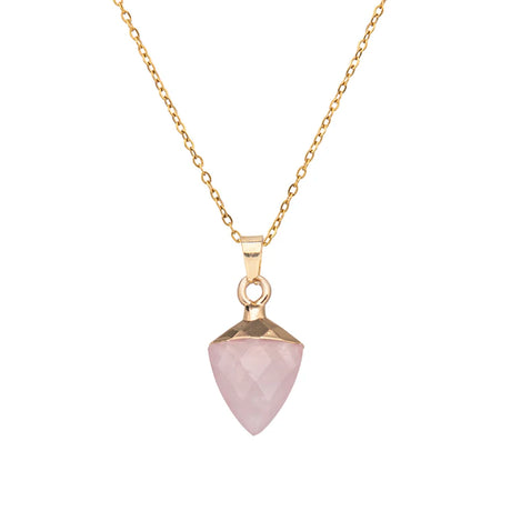 Necklace with a pink stone pendant on a gold chain against a white background
