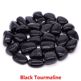 Black tourmaline stones on a white background with 'Black Tourmaline' text.