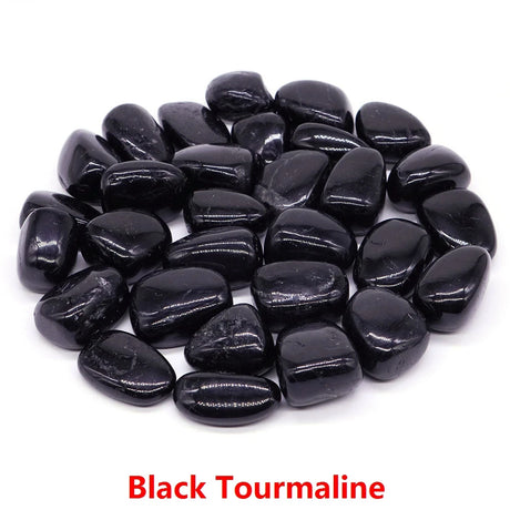 Black tourmaline stones on a white background with 'Black Tourmaline' text.
